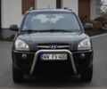 Черный Хендай Туксон, объемом двигателя 2 л и пробегом 184 тыс. км за 5480 $, фото 5 на Automoto.ua
