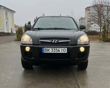 Черный Хендай Туксон, объемом двигателя 2 л и пробегом 128 тыс. км за 9200 $, фото 2 на Automoto.ua
