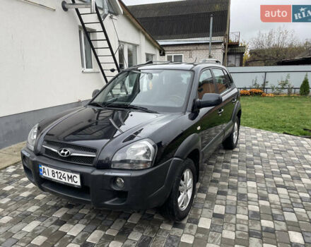 Чорний Хендай Туксон, об'ємом двигуна 2 л та пробігом 200 тис. км за 8450 $, фото 10 на Automoto.ua