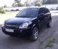 Черный Хендай Туксон, объемом двигателя 2 л и пробегом 220 тыс. км за 7500 $, фото 2 на Automoto.ua