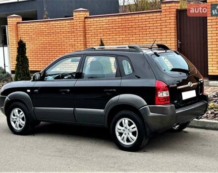 Черный Хендай Туксон, объемом двигателя 2 л и пробегом 102 тыс. км за 10900 $, фото 1 на Automoto.ua