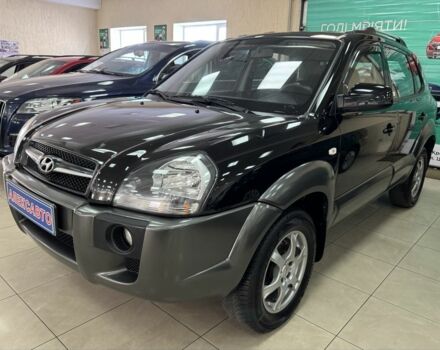Черный Хендай Туксон, объемом двигателя 2 л и пробегом 160 тыс. км за 8300 $, фото 2 на Automoto.ua