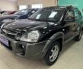 Черный Хендай Туксон, объемом двигателя 2 л и пробегом 160 тыс. км за 8300 $, фото 2 на Automoto.ua