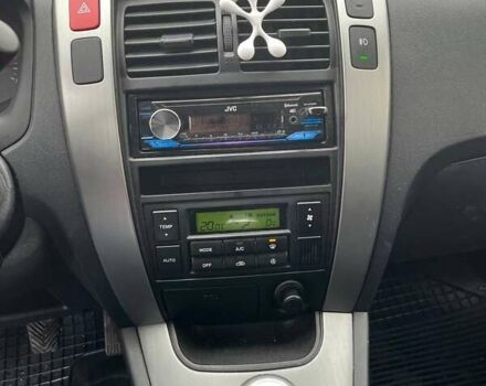 Черный Хендай Туксон, объемом двигателя 2 л и пробегом 128 тыс. км за 9200 $, фото 19 на Automoto.ua