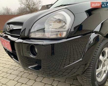 Черный Хендай Туксон, объемом двигателя 2 л и пробегом 114 тыс. км за 8850 $, фото 13 на Automoto.ua