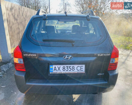 Черный Хендай Туксон, объемом двигателя 1.99 л и пробегом 95 тыс. км за 8700 $, фото 11 на Automoto.ua