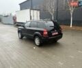 Черный Хендай Туксон, объемом двигателя 2 л и пробегом 237 тыс. км за 8350 $, фото 4 на Automoto.ua
