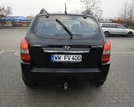 Черный Хендай Туксон, объемом двигателя 2 л и пробегом 184 тыс. км за 5480 $, фото 11 на Automoto.ua