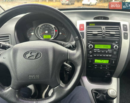 Чорний Хендай Туксон, об'ємом двигуна 1.98 л та пробігом 230 тис. км за 8700 $, фото 19 на Automoto.ua