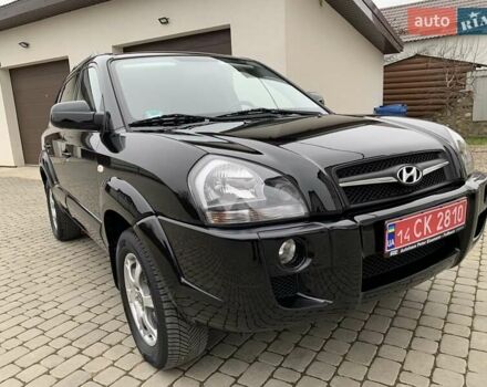Черный Хендай Туксон, объемом двигателя 2 л и пробегом 114 тыс. км за 8850 $, фото 4 на Automoto.ua