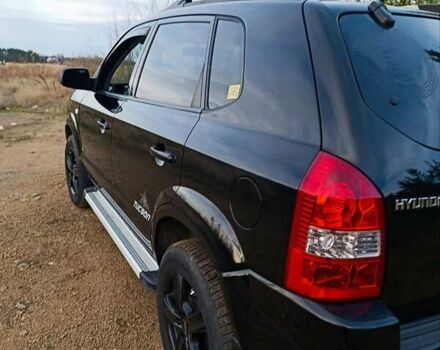 Чорний Хендай Туксон, об'ємом двигуна 1.98 л та пробігом 172 тис. км за 9500 $, фото 3 на Automoto.ua