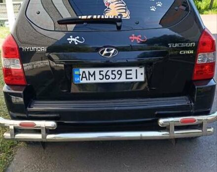 Черный Хендай Туксон, объемом двигателя 2 л и пробегом 226 тыс. км за 8700 $, фото 10 на Automoto.ua