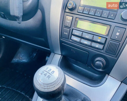 Черный Хендай Туксон, объемом двигателя 1.99 л и пробегом 95 тыс. км за 8700 $, фото 25 на Automoto.ua