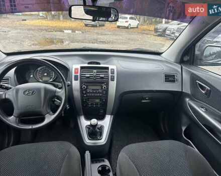 Чорний Хендай Туксон, об'ємом двигуна 1.98 л та пробігом 230 тис. км за 8700 $, фото 13 на Automoto.ua