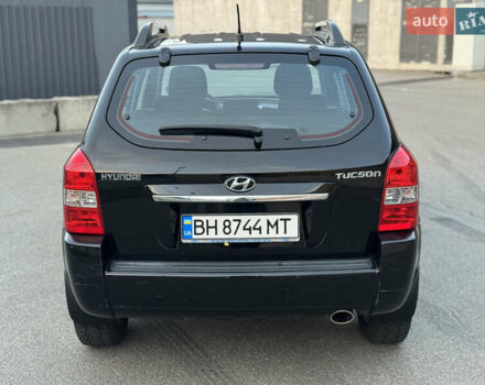 Хендай Туксон 2009 в Киеве на Automoto.ua Черный Хендай Туксон, объемом двигателя 2 л и пробегом 110 тыс. км за 8700 $, фото 5 на Automoto.ua