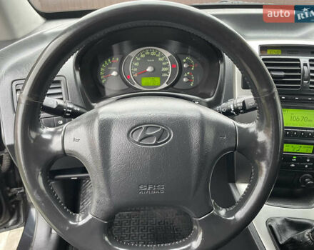 Чорний Хендай Туксон, об'ємом двигуна 2 л та пробігом 200 тис. км за 8450 $, фото 37 на Automoto.ua