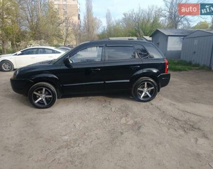 Черный Хендай Туксон, объемом двигателя 1.98 л и пробегом 51 тыс. км за 12800 $, фото 6 на Automoto.ua