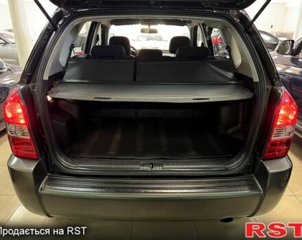 Черный Хендай Туксон, объемом двигателя 2 л и пробегом 160 тыс. км за 8800 $, фото 3 на Automoto.ua