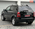 Чорний Хендай Туксон, об'ємом двигуна 2 л та пробігом 163 тис. км за 9199 $, фото 4 на Automoto.ua