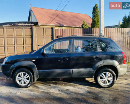 Черный Хендай Туксон, объемом двигателя 1.99 л и пробегом 95 тыс. км за 8500 $, фото 42 на Automoto.ua