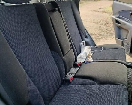 Чорний Хендай Туксон, об'ємом двигуна 1.98 л та пробігом 172 тис. км за 9500 $, фото 13 на Automoto.ua