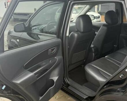 Черный Хендай Туксон, объемом двигателя 2 л и пробегом 237 тыс. км за 8350 $, фото 22 на Automoto.ua