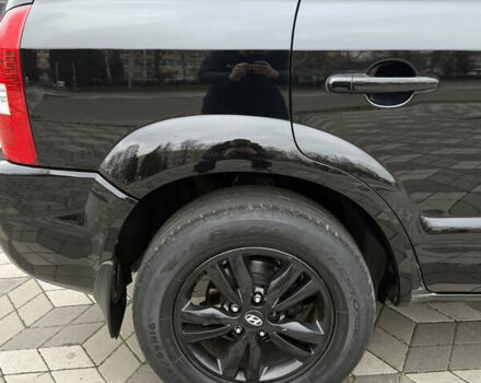 Черный Хендай Туксон, объемом двигателя 2 л и пробегом 191 тыс. км за 8500 $, фото 16 на Automoto.ua