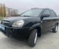 Черный Хендай Туксон, объемом двигателя 2 л и пробегом 168 тыс. км за 7500 $, фото 1 на Automoto.ua