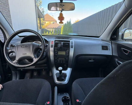 Чорний Хендай Туксон, об'ємом двигуна 1.98 л та пробігом 200 тис. км за 8200 $, фото 7 на Automoto.ua