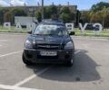 Черный Хендай Туксон, объемом двигателя 1.98 л и пробегом 208 тыс. км за 7500 $, фото 1 на Automoto.ua