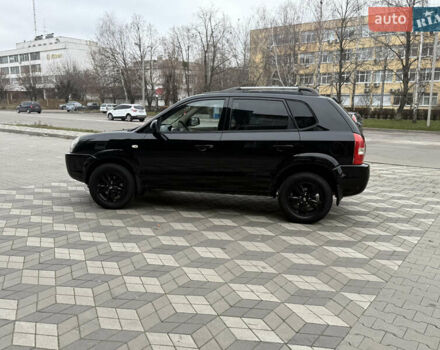 Черный Хендай Туксон, объемом двигателя 2 л и пробегом 191 тыс. км за 8500 $, фото 30 на Automoto.ua