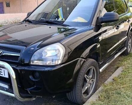 Черный Хендай Туксон, объемом двигателя 2 л и пробегом 226 тыс. км за 8700 $, фото 9 на Automoto.ua