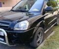 Черный Хендай Туксон, объемом двигателя 2 л и пробегом 226 тыс. км за 8700 $, фото 9 на Automoto.ua