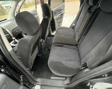 Черный Хендай Туксон, объемом двигателя 2 л и пробегом 128 тыс. км за 9200 $, фото 11 на Automoto.ua