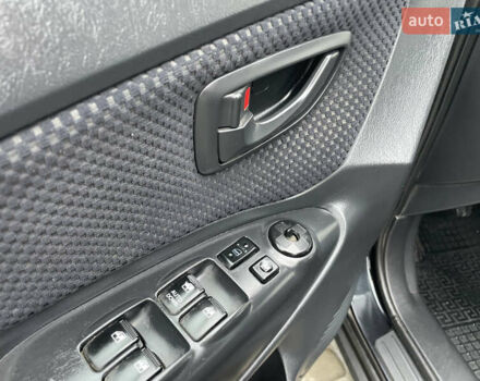 Чорний Хендай Туксон, об'ємом двигуна 2 л та пробігом 200 тис. км за 8450 $, фото 25 на Automoto.ua