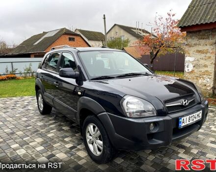 Чорний Хендай Туксон, об'ємом двигуна 2 л та пробігом 200 тис. км за 8499 $, фото 2 на Automoto.ua