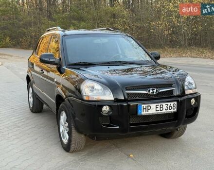 Черный Хендай Туксон, объемом двигателя 2 л и пробегом 148 тыс. км за 8700 $, фото 5 на Automoto.ua