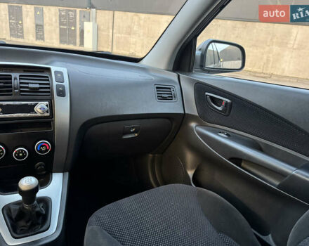 Хендай Туксон 2009 в Киеве на Automoto.ua Черный Хендай Туксон, объемом двигателя 2 л и пробегом 110 тыс. км за 8700 $, фото 30 на Automoto.ua