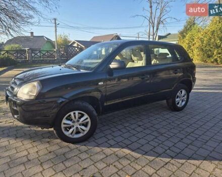 Чорний Хендай Туксон, об'ємом двигуна 2 л та пробігом 187 тис. км за 7900 $, фото 1 на Automoto.ua