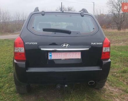 Черный Хендай Туксон, объемом двигателя 2 л и пробегом 198 тыс. км за 8200 $, фото 10 на Automoto.ua