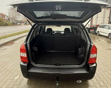 Черный Хендай Туксон, объемом двигателя 2 л и пробегом 237 тыс. км за 8350 $, фото 5 на Automoto.ua