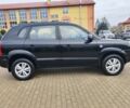 Чорний Хендай Туксон, об'ємом двигуна 1.98 л та пробігом 148 тис. км за 6199 $, фото 4 на Automoto.ua