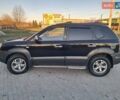 Черный Хендай Туксон, объемом двигателя 1.98 л и пробегом 233 тыс. км за 7850 $, фото 1 на Automoto.ua