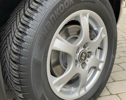 Черный Хендай Туксон, объемом двигателя 2 л и пробегом 114 тыс. км за 8850 $, фото 75 на Automoto.ua