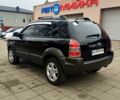 Чорний Хендай Туксон, об'ємом двигуна 2 л та пробігом 191 тис. км за 8900 $, фото 3 на Automoto.ua