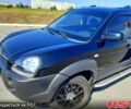 Черный Хендай Туксон, объемом двигателя 20 л и пробегом 150 тыс. км за 8900 $, фото 1 на Automoto.ua