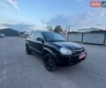 Чорний Хендай Туксон, об'ємом двигуна 1.98 л та пробігом 154 тис. км за 9300 $, фото 1 на Automoto.ua