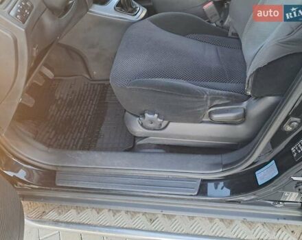Черный Хендай Туксон, объемом двигателя 1.98 л и пробегом 233 тыс. км за 7850 $, фото 11 на Automoto.ua