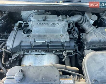 Чорний Хендай Туксон, об'ємом двигуна 2 л та пробігом 187 тис. км за 7900 $, фото 12 на Automoto.ua