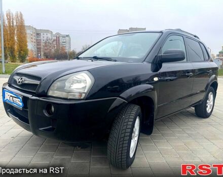 Черный Хендай Туксон, объемом двигателя 2 л и пробегом 168 тыс. км за 7700 $, фото 2 на Automoto.ua